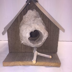 Knot hole bird house