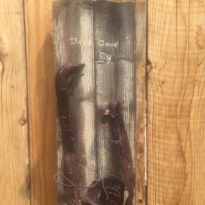 Old lantern mounted on old wood