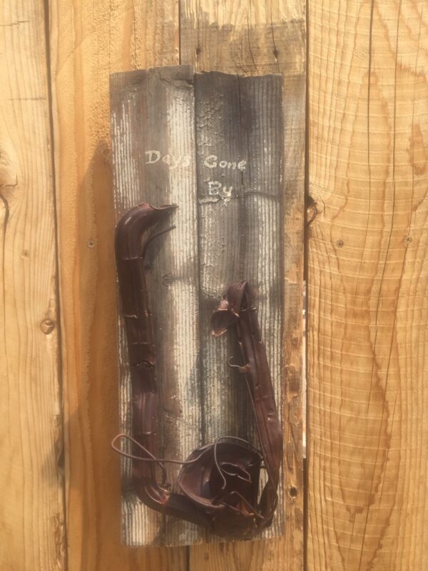Old lantern mounted on old wood
